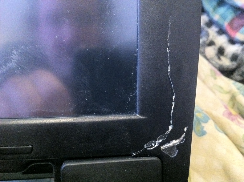 Cracks in the bondo / chipping paint at bottom right.
Also, my blurry reflection! Hello! RIghtCracks_HDR.jpg